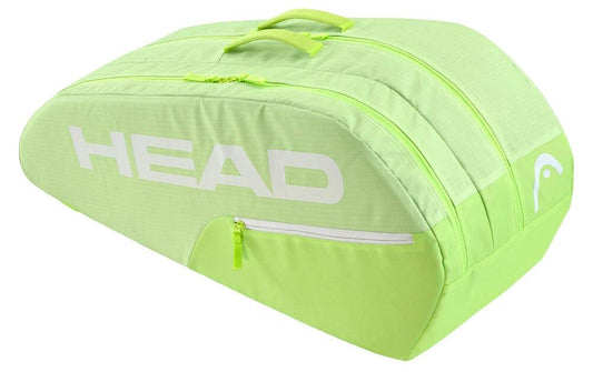 The HEAD BASE 6 Racket Tennis Bag M - SG in lime green features large white branding, two top zippers, and a smaller side pocket for practical storage. A single handle ensures easy, stylish carrying of your gear.