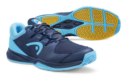 The HEAD Grid 3.5 Indoor Court Tennis Shoes in dark blue with aqua accents are designed with breathable mesh for enhanced comfort. One shoe stands upright, showcasing the side and top view, while the other highlights the non-slip sole, making it an ideal choice for indoor court activities.