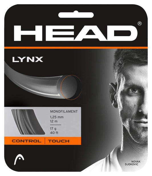 The packaging of the HEAD Lynx Tennis String Set in Anthracite Grey from HEAD highlights a close-up view of the strings, emphasizing their 1.25 mm thickness, 12 m length, and 17g weight. Constructed with a monofilament string using an innovative co-polymer mixture, it also features the partial black and white face of a man on the design.