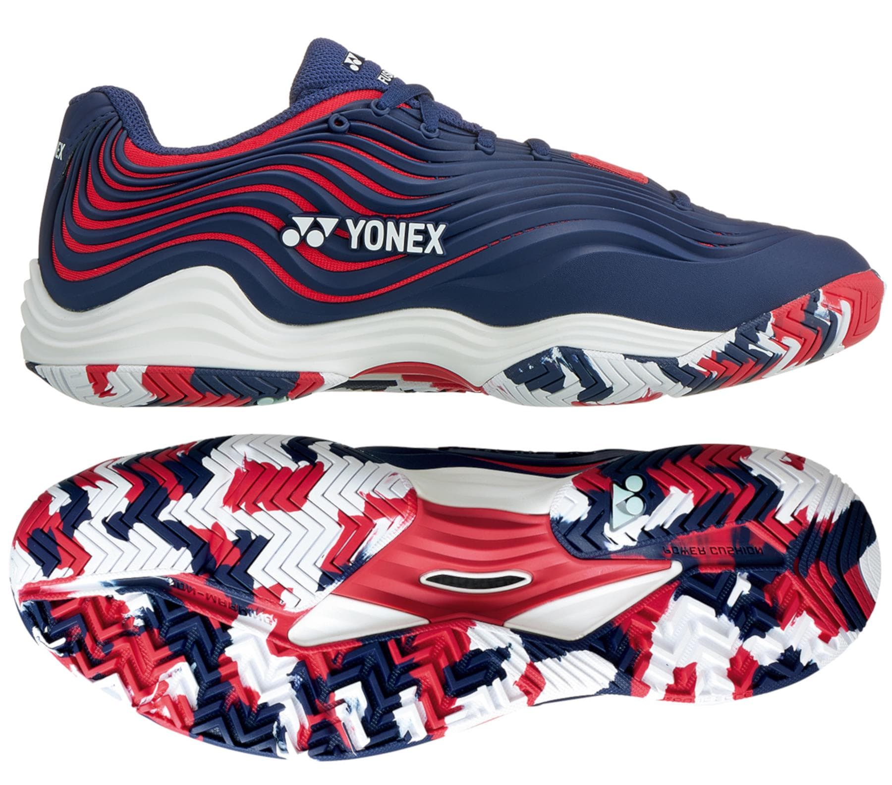 Introducing the Yonex Power Cushion FusionRev 5 Men's Tennis Shoes in Navy and Red. These shoes showcase a wavy design in navy, red, and white, complemented by a sleek upper with prominent Yonex branding. The sole features the state-of-the-art Power Cushion technology along with an eye-catching dynamic zigzag pattern that harmonizes with the shoe’s color scheme.