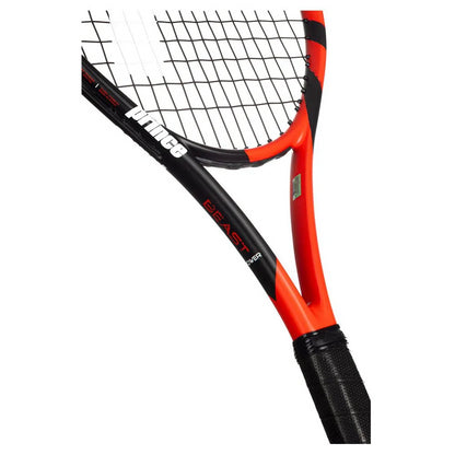 The Prince Beast Power 285g Tennis Racket in red and black highlights its graphite frame, black handle, and precision-engineered string grid.