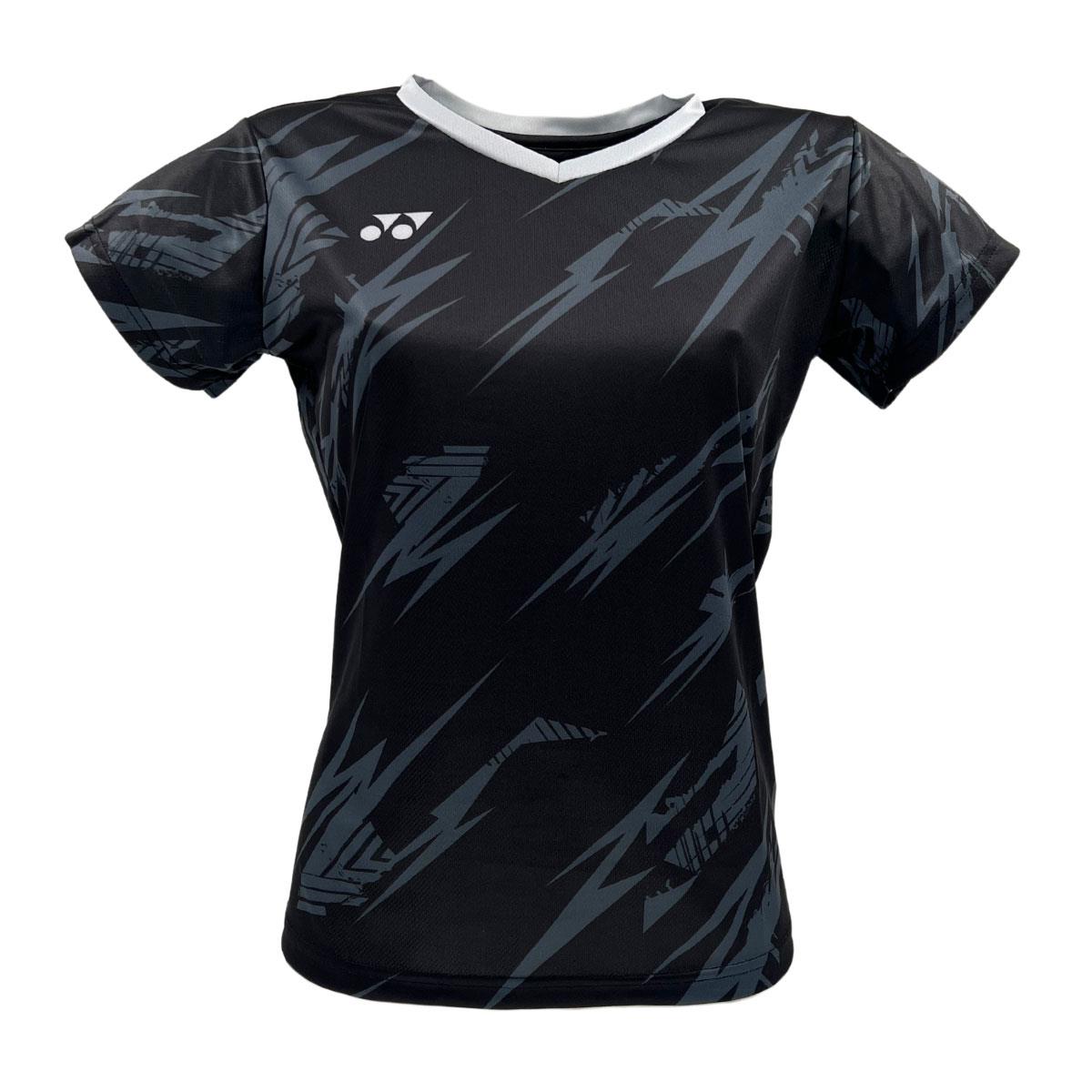 The Yonex YTL8 Women's Tennis T-Shirt in Black/Silver is made of moisture-wicking polyester, featuring a lightning bolt pattern and a small logo on the left chest. Designed for comfort and performance, it has short sleeves and a white V-shaped collar.