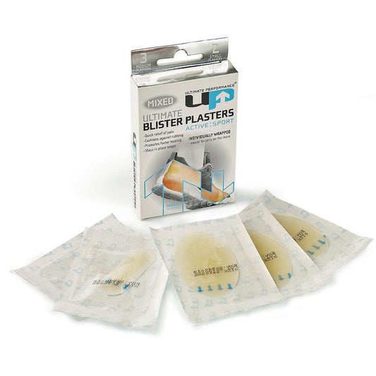 A box of Ultimate Performance Blister Plaster Mixed Pack is displayed with five individually wrapped plasters spread out in front. The packaging highlights blister plasters specifically designed for active sports, offering pain relief and promoting faster healing.