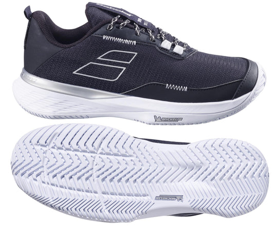 The Babolat SFX EVO All Court 2025 Women's Tennis Shoes in Black/Silver feature a sleek side view with silver accents, ideal for tennis. The white soles show a textured tread for grip and comfort, along with the Babolat logo.