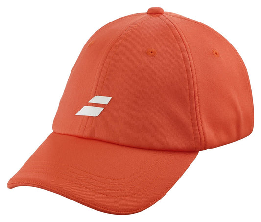 The Babolat Pure Logo Cap - Fiesta Red is a lightweight baseball cap designed by Babolat, made from recycled polyester. This cap showcases a curved brim and a striking white logo with two horizontal bars prominently displayed on the front. It also includes visible stitching and ventilation holes to enhance comfort.