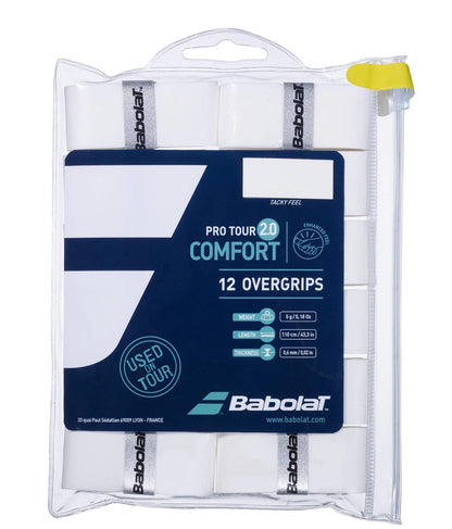 The Babolat Pro Tour 2.0 Comfort Tennis Overgrip 12 Pack in white, suitable for advanced players, comes in clear plastic packaging with a zip closure. It prominently features the "Used in Tour" label and includes detailed product specifications such as weight, length, and thickness on the front.