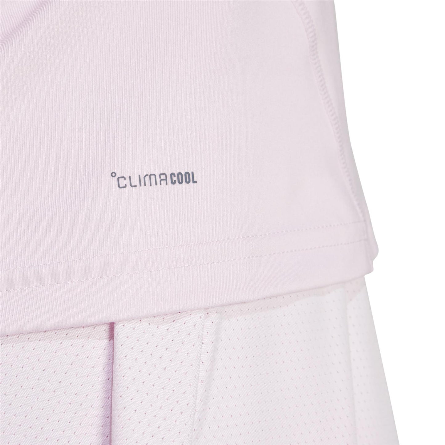 Close-up of an ADIDAS Womens Club Tennis Tank Top in pink by adidas, highlighting breathable, recycled fabric and texture with the "Climacool" logo.