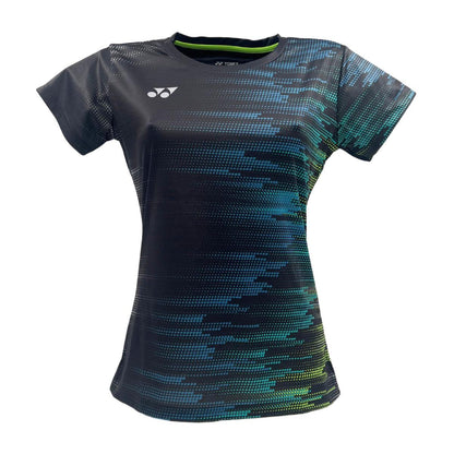 The Yonex YTL7 Women's Tennis T-Shirt - Shadow features a digital-style blue and green pattern on black, with a white Yonex logo on the top left. Made from moisture-wicking polyester, its lightweight fabric ensures breathability and has a round neckline.