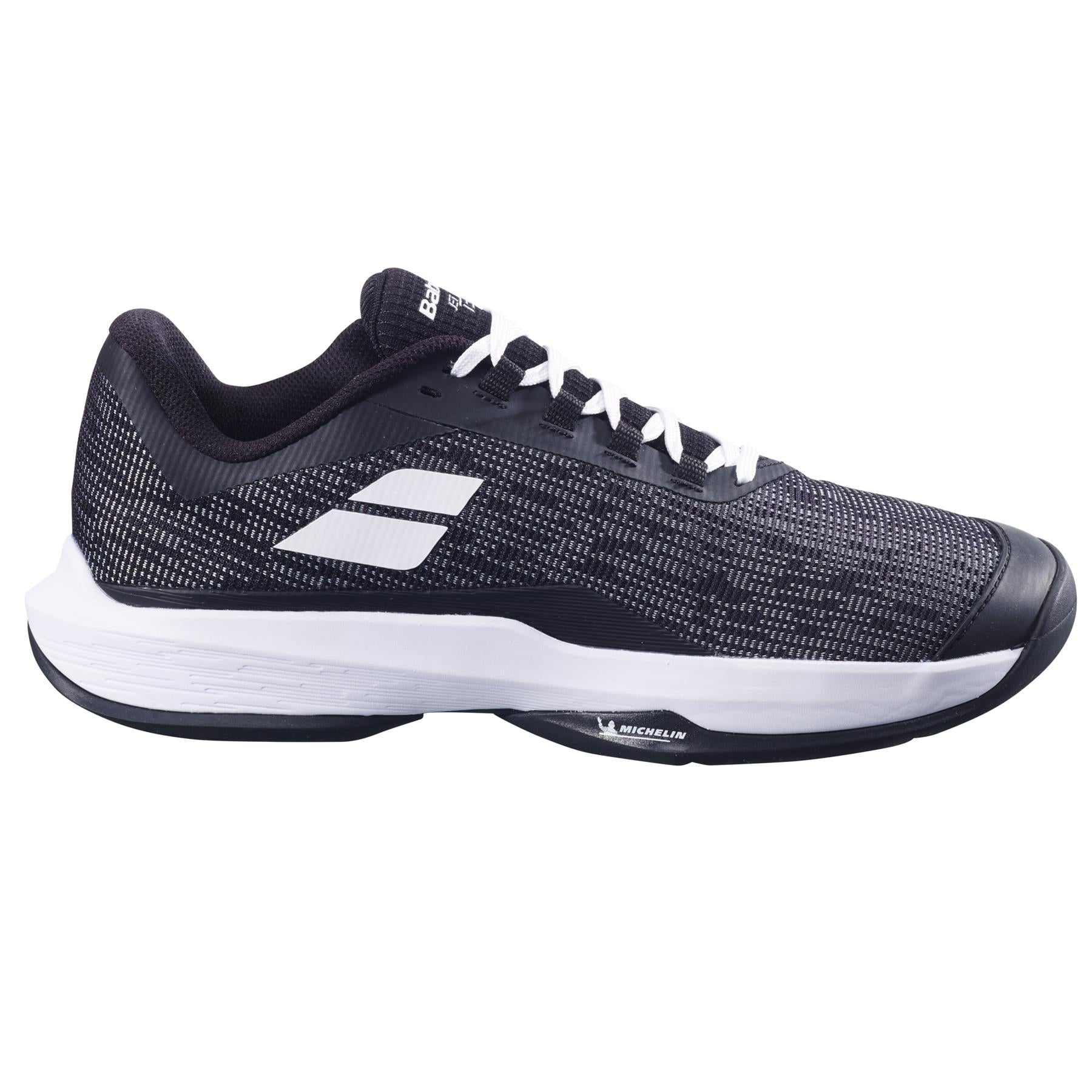 The Babolat Jet Tere 2 All Court 2025 Men's Tennis Shoes in black and white feature an ultra-lightweight design with a patterned mesh upper, white side stripes, and a cushioned sole for comfort. The sole's visible tread pattern is displayed against a plain white background.