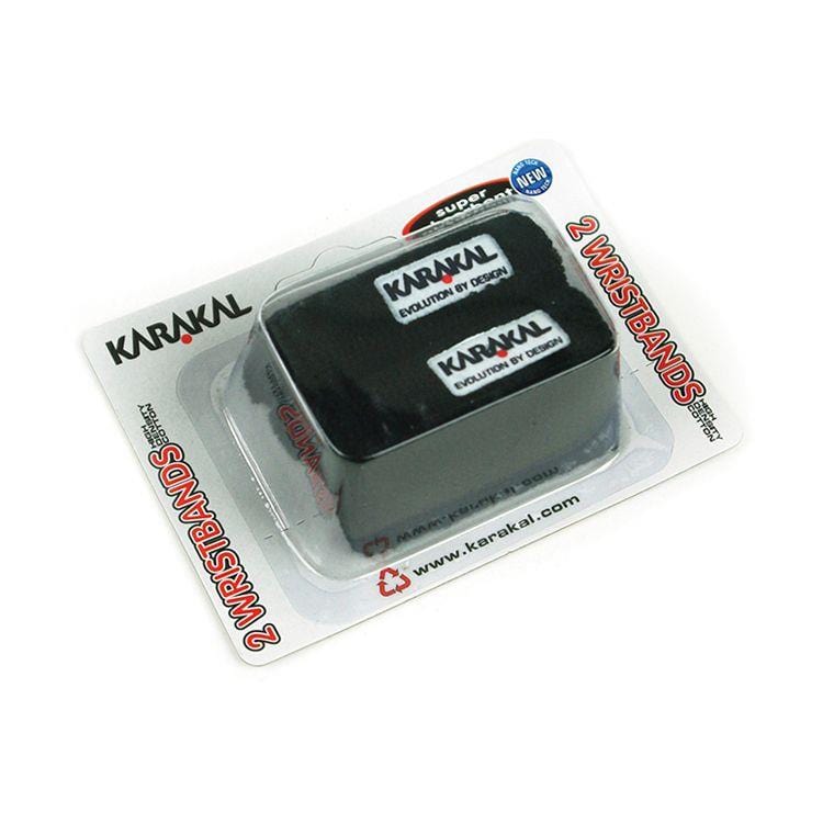 Product: Karakal Tennis Wrist Band (Twin Pack) - Black  
Brand: Karakal

Description: This package includes two black Karakal Tennis Wristbands, each featuring the "Evolution by Design" logo. Crafted from absorbent cotton for superior performance, the packaging emphasizes features like "Super Absorbent" and contains "2 Wristbands.