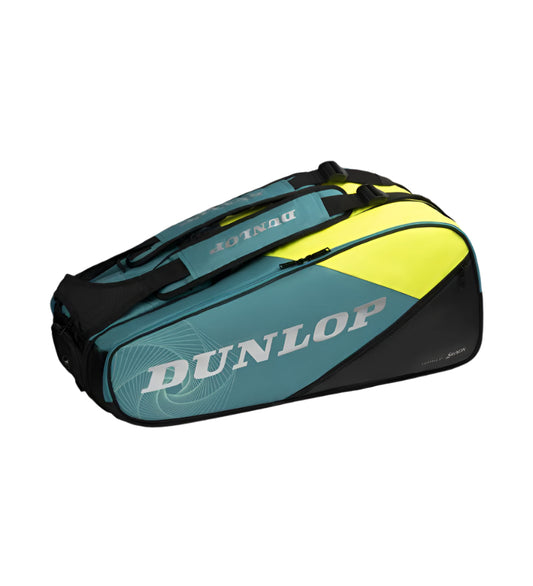 The Dunlop SX Performance 8 Racket Tennis Bag in teal, black, and yellow features the iconic Dunlop logo on its side and includes multiple zippered compartments and sturdy shoulder straps, ideal for comfortably carrying up to 8 rackets.