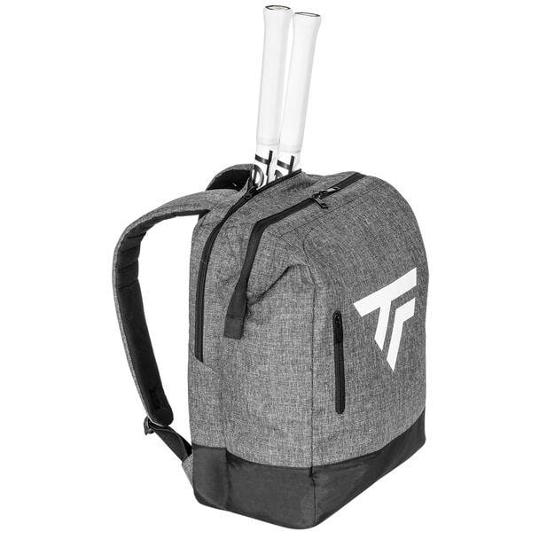 The Tecnifibre All Vision Tennis Backpack - Grey is purpose-built for racquet sports, featuring adjustable straps and a wide-angle opening with a large zippered compartment that accommodates two tennis rackets extending from the top. The backpack showcases a stylish white Tecnifibre logo on the front.