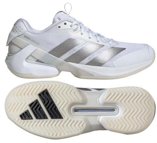 The adidas Adizero Ubersonic 5 women's tennis shoes in white feature a low-top design and textured soles. With three silver stripes, these shoes offer a modern look with a lightweight mesh upper and logo accent for style.