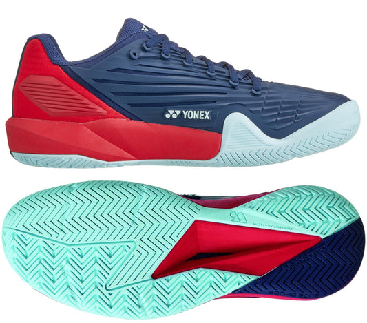 A pair of Yonex Power Cushion Eclipsion 5 Men's Tennis Shoes with a navy upper and red highlights, featuring light blue soles. The top shoe is displayed from the side, while the bottom shoe showcases its sole, emphasizing the intricate tread pattern and shock-absorbing design ideal for all-court play.