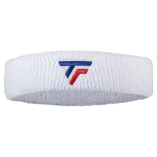 The Tecnifibre Tennis Headband in white is made from fabric and includes a small geometric logo in blue and red. Featuring an elastic design, it fits comfortably on your head while effectively managing perspiration during intense activities.