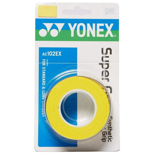 The Yonex AC102EX Super Grap Tennis Overgrip - 3 Pack in yellow provides outstanding sweat absorption. It comes packaged in a predominantly white and green design, featuring a clear window that displays the rolled overgrips inside. The packaging confirms its suitability for both standard and long racquet use.