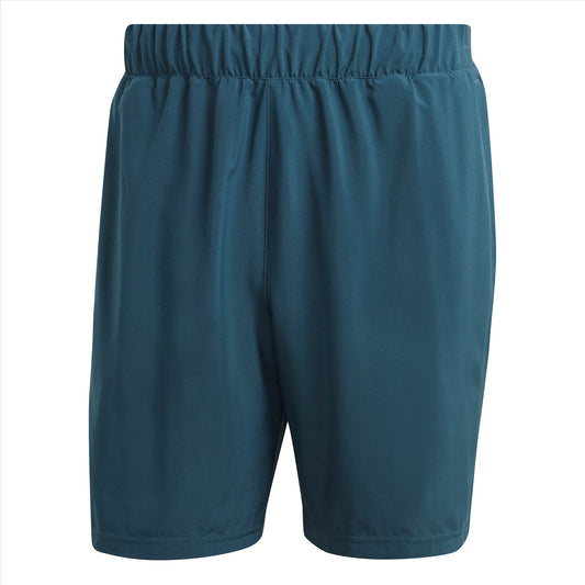 A pair of adidas Club Stretch Woven 7" Men's Tennis Shorts in green, equipped with AEROREADY technology and an elastic waistband, displayed against a white background.