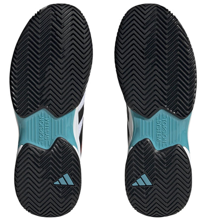 The image displays the soles of the adidas CourtJam Control Men's Tennis Shoes, showcasing a zigzag tread pattern. They feature black rubber soles with turquoise accents and are complemented by an Engineered Mesh Upper. The "TORSION SYSTEM" is printed near the arches to provide added support.