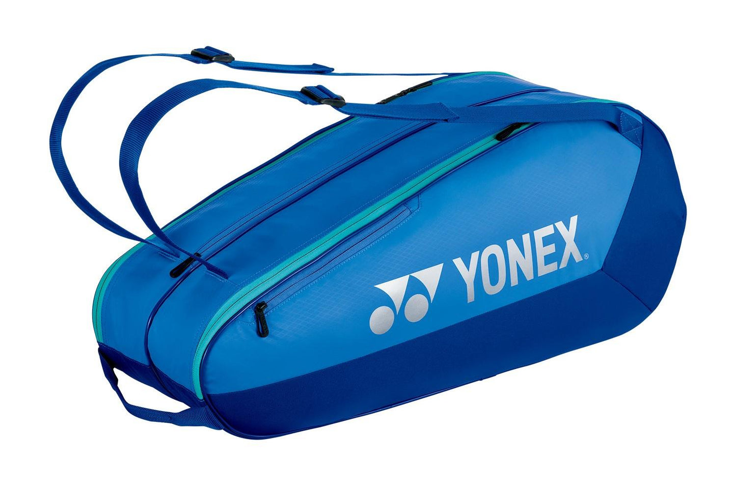 The Yonex 42526EX Team 6 Racket Tennis Bag in Blast Blue features adjustable shoulder straps, a zippered main compartment, and a shoe compartment. The Yonex logo is prominently displayed on the side.