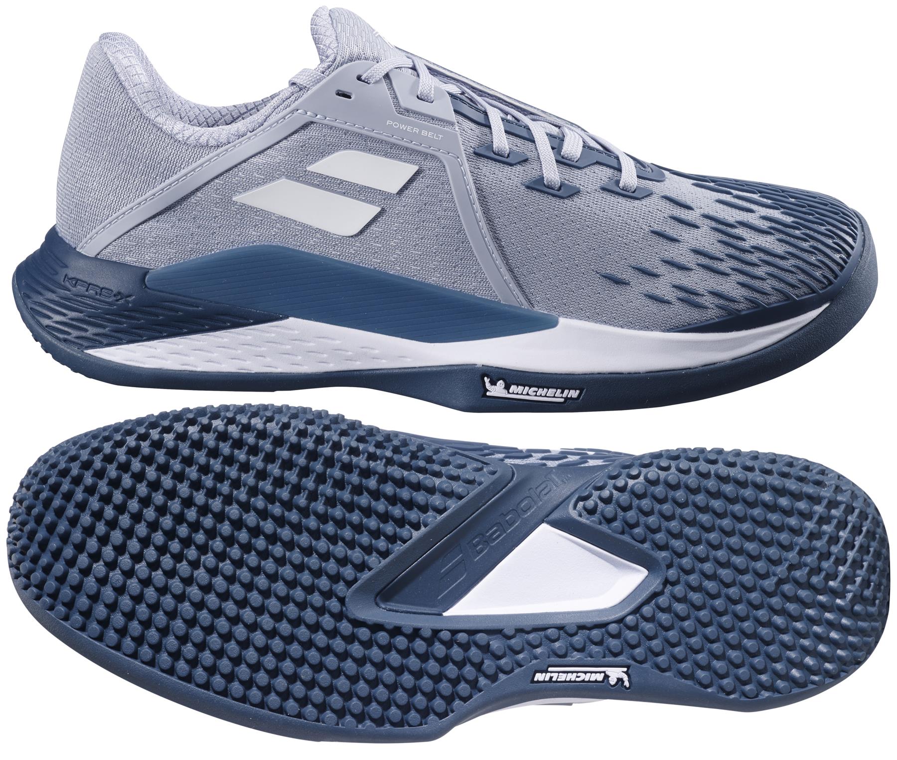 A pair of Babolat Propulse Fury 3 Sand & Grass Court 2025 men's tennis shoes in grey and white, featuring Michelin-branded textured rubber soles and a mesh upper. One shoe is shown from the side, the other from the bottom, ideal for tennis enthusiasts seeking grip and durability.