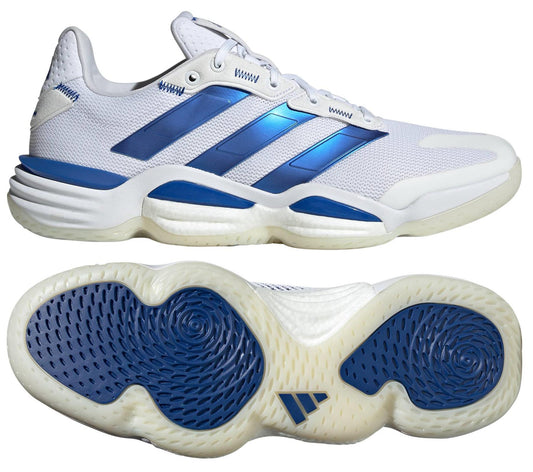 The ADIDAS Stabil 16 Men's Indoor Court Shoes feature a sleek design in white with metallic blue stripes, an adidas BOOST midsole, and a patterned sole for grip. Perfect for a modern and sporty look.