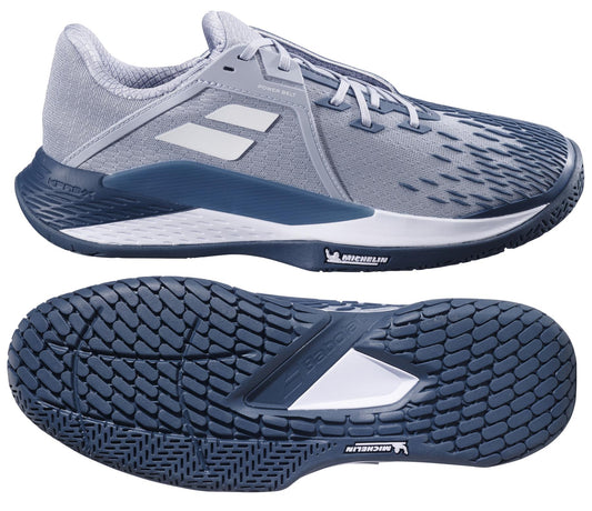 The Babolat Propulse Fury 3 All Court 2025 men's tennis shoes in gray and white feature mesh uppers, white logo details, and Michelin Original rubber soles with a detailed tread pattern for superior grip, ideal for all-court play.