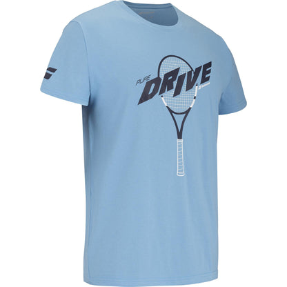 The Babolat Drive Unisex Cotton T-Shirt in light blue features a prominent tennis racquet graphic with "PURE DRIVE" on the front, plus a small Babolat logo and stylized stripes on the sleeve.