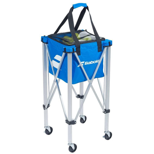 Introducing the Babolat Wheeled Tennis Ball Cart, a collapsible tennis ball hopper designed in blue with a chic black mesh cover and handy handles, mounted on a sleek silver metal frame. This cart by Babolat is equipped with four wheels, offering effortless transport and seamless mobility during practice sessions.