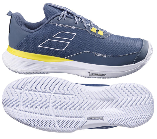 The Babolat SFX EVO All Court 2025 Men's Tennis Shoes in dark grey and white feature a side view showcasing the brand logo and laces, with an outsole view of Michelin Original rubber and patterned tread for superior grip.