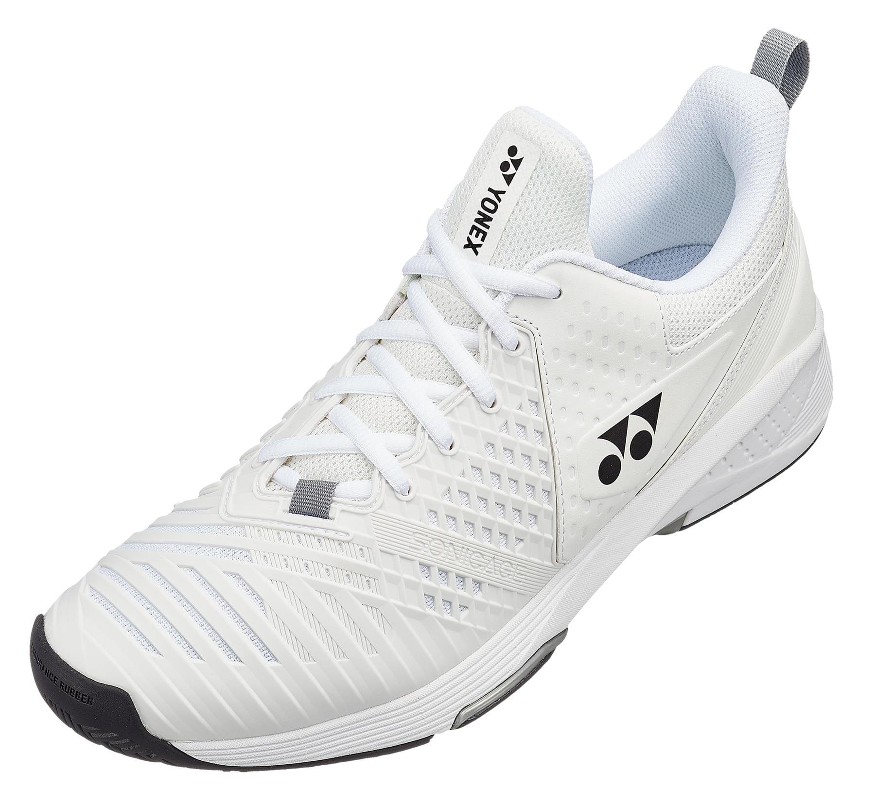 The Yonex Power Cushion Sonicage 3 Wide Men's Tennis Shoes in White/Black showcase a textured design with a patterned sole, proudly displaying the Yonex logo on both the side and tongue. Equipped with the acclaimed Yonex Power Cushion technology and featuring white laces, these shoes are ideal for tennis or any active wear needs.