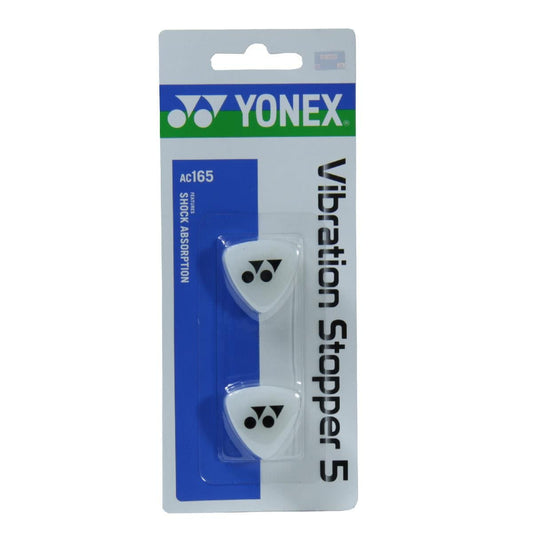 The Yonex AC165 Tennis Vibration Damper - Clear includes two white vibration dampeners featuring the Yonex logo. The packaging showcases a sleek blue and white design, emphasizing its ability to absorb shock and effectively reduce racket vibrations.