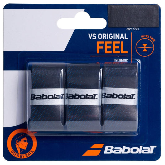 A pack of Babolat VS Original X3 Badminton Overgrips in black and blue offers three high-absorbing grips with distinctive Babolat branding. The packaging features the "Ultra Thin" and "Used by Rafa" labels, promising exceptional performance for both badminton and tennis players.