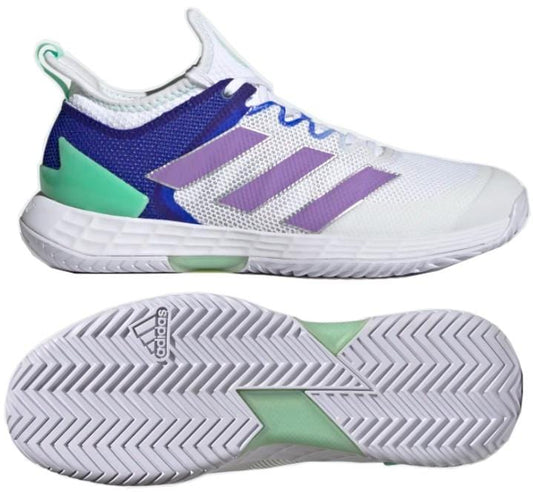 The adidas Adizero Ubersonic 4 Women's Tennis Shoes feature a Cloud White and Violet Fusion color scheme with Silver Metallic accents, showcasing a design that combines white mesh with purple details and the brand's signature three stripes. The sole includes green highlights and a herringbone pattern for enhanced traction, making them ideal for hard courts. The adidas Adizero Ubersonic 4 logo is prominently displayed on the sole.