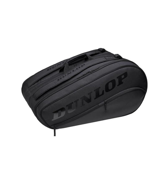 Introducing the Dunlop Team 12 Racket Thermo Tennis Bag in black, crafted for a sleek and modern look. This bag features multiple compartments and carrying straps, with the "DUNLOP" logo prominently displayed on the side. Enjoy advanced thermo insulation to protect your gear stylishly.