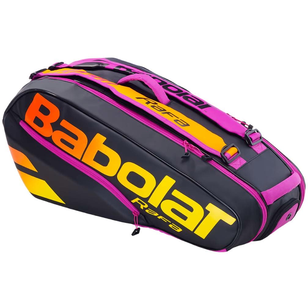 A Babolat RH6 Pure Aero RAFA 6 Racket Tennis Bag in black, orange, and purple showcases a vibrant design with the name "Rafa" prominently displayed on its sides. It features multiple compartments, including an insulated section for rackets.