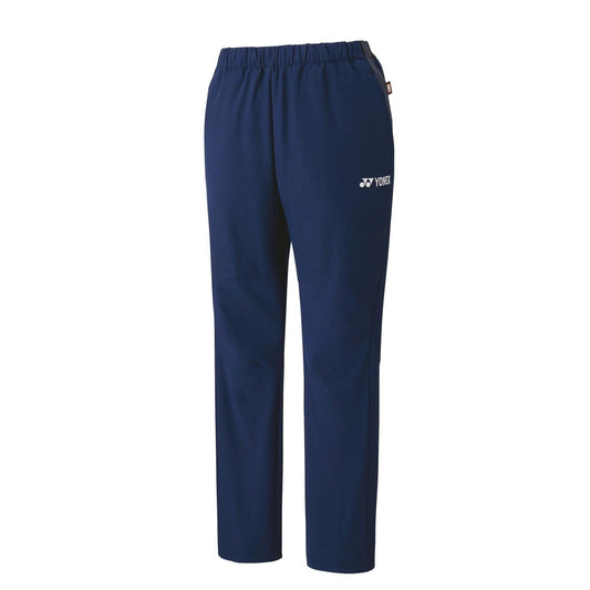 The Yonex 80090 Tracksuit Pants - Navy Blue feature an elastic waistband and a straight-leg silhouette. Adorned with the Yonex logo on the front upper leg, these pants are designed with Heat Capsule technology to provide extra warmth, ensuring they offer a smooth and comfortable wearing experience.